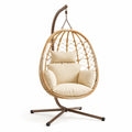 Sillón colgante de ratán sintético con cojines de poliéster beige